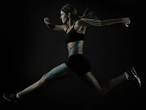 kinesiotape on leaping female athlete